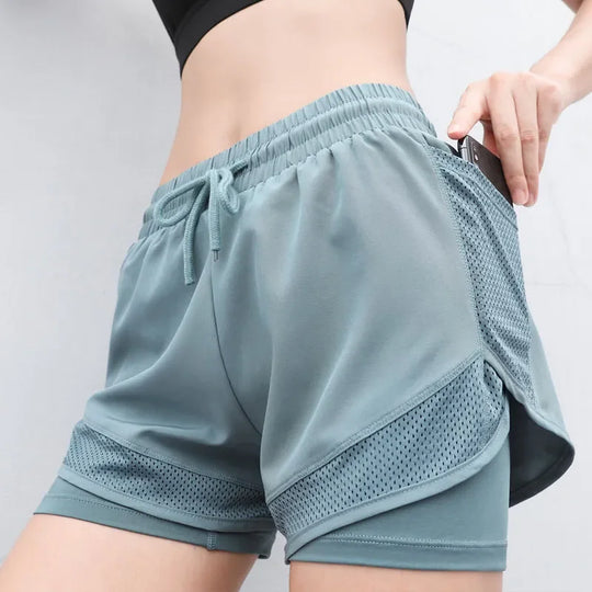 short-de-sport-femme-PowersFit™-vert-confort-haut-de-gamme-et-liberté-totale